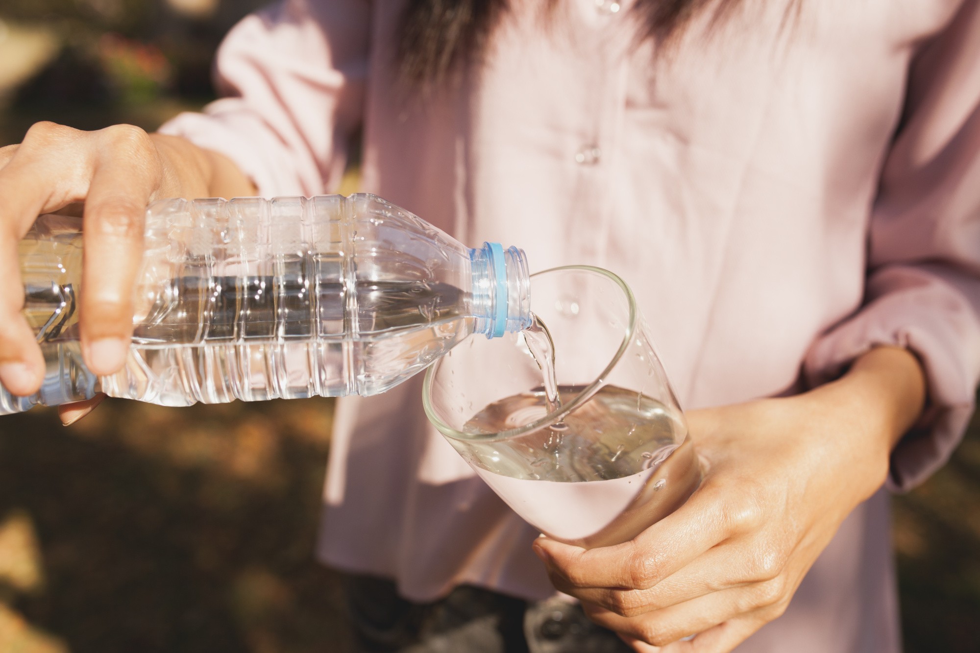 woman-filling-glass-water.jpg