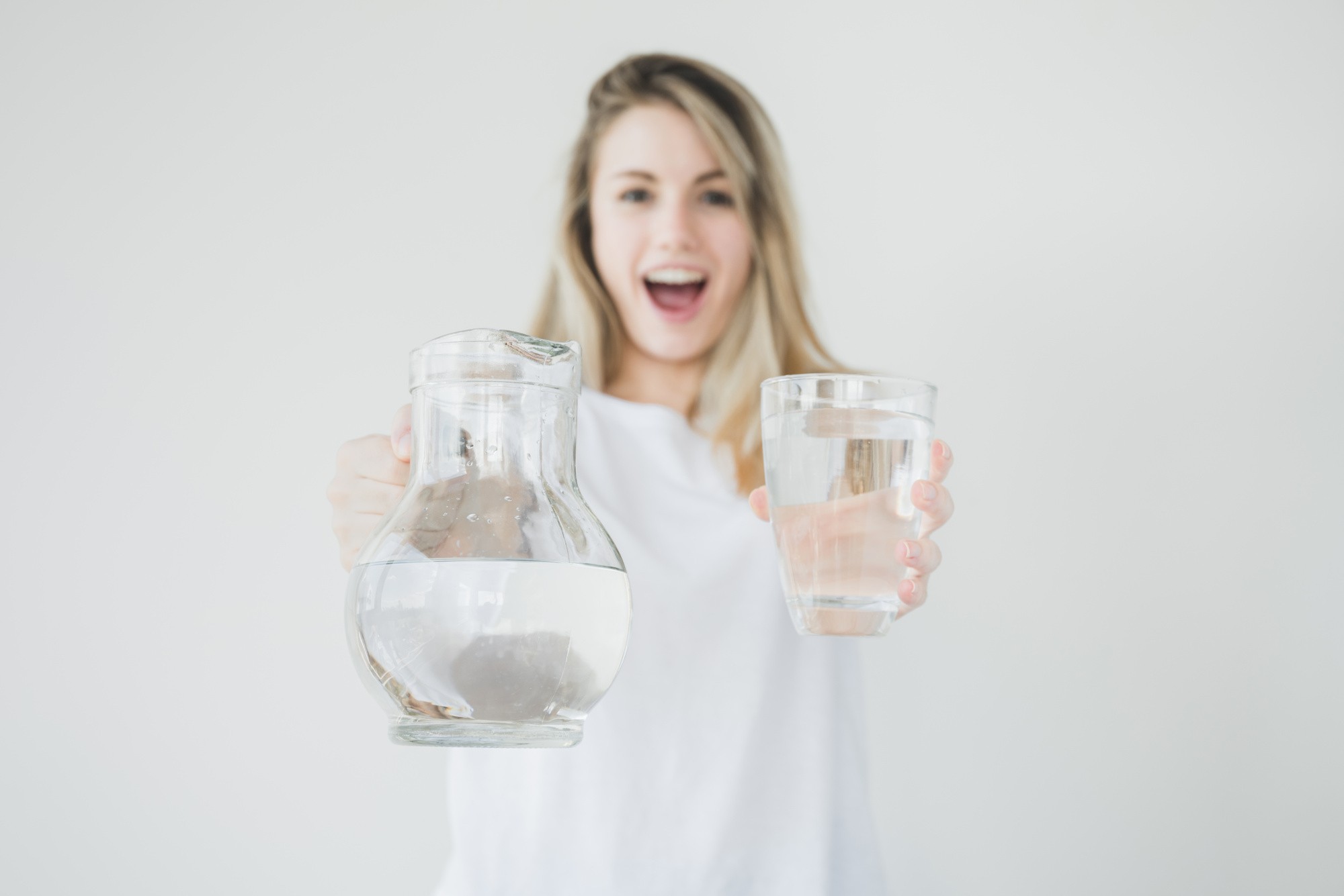 blonde-girl-holding-jar-glass-water.jpg