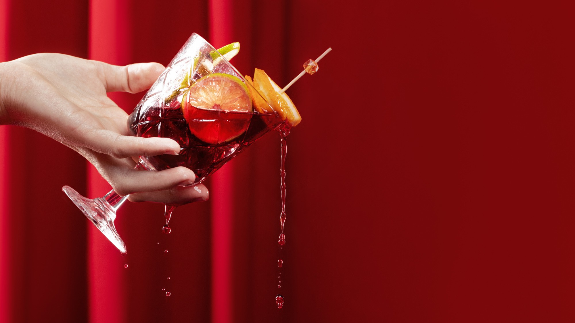 delicious-sangria-cocktail-held-hand.jpg