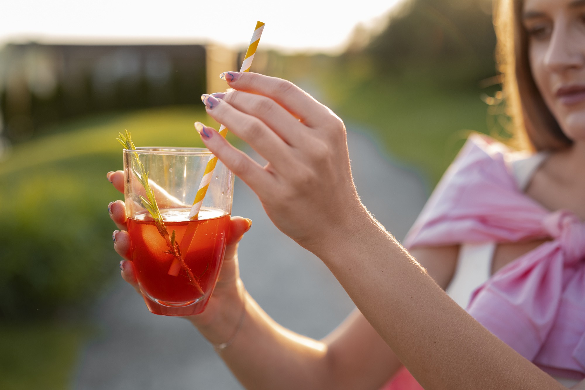 side-view-woman-with-delicious-kombucha-outdoors.jpg