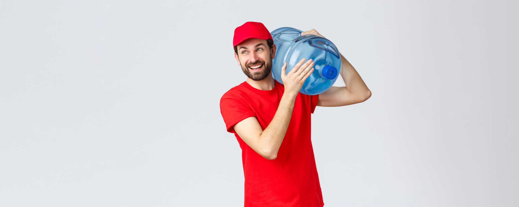 takeaway-food-groceries-delivery-covid19-contactless-orders-concept-cheerful-smiling-bearded-courier-red-uniform-cap-bring-bottled-water-office-house-look-away-joyful.jpg