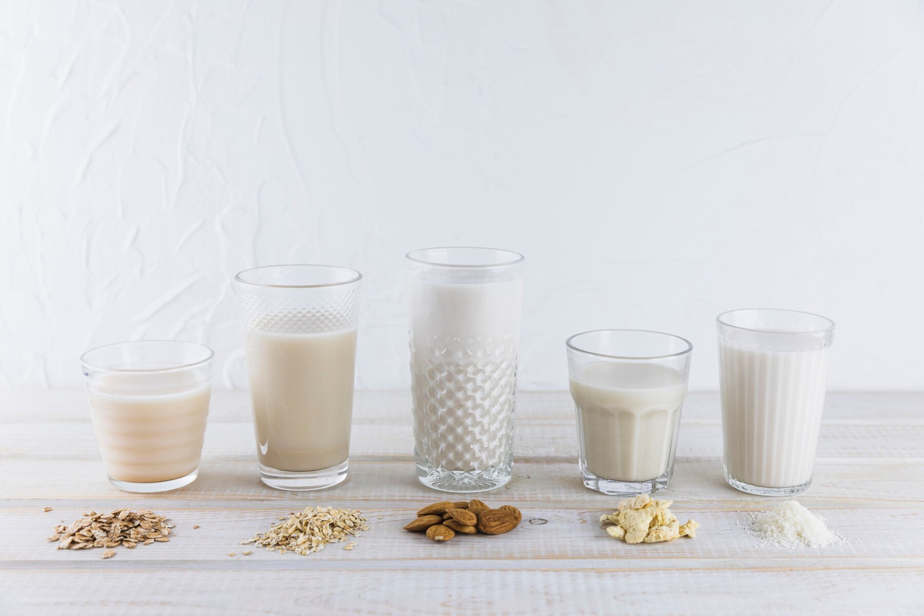 milk-in-different-types-of-glasses-and-cereals_23-2147987748.jpg