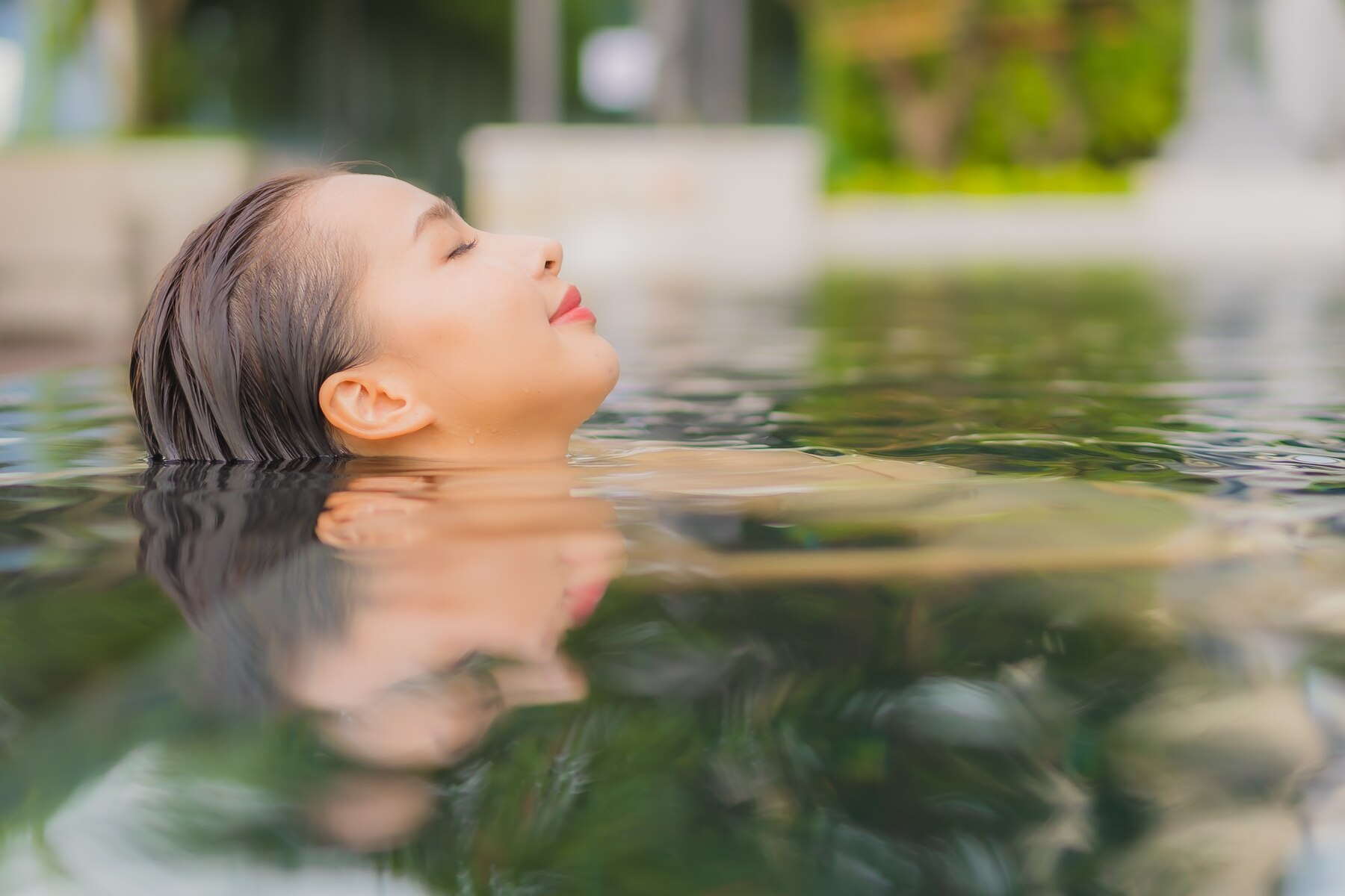 portrait-beautiful-young-asian-woman-relax-smile-around-outdoor-swimming-pool-hotel-resort-vacation-travel_74190-12745.jpg