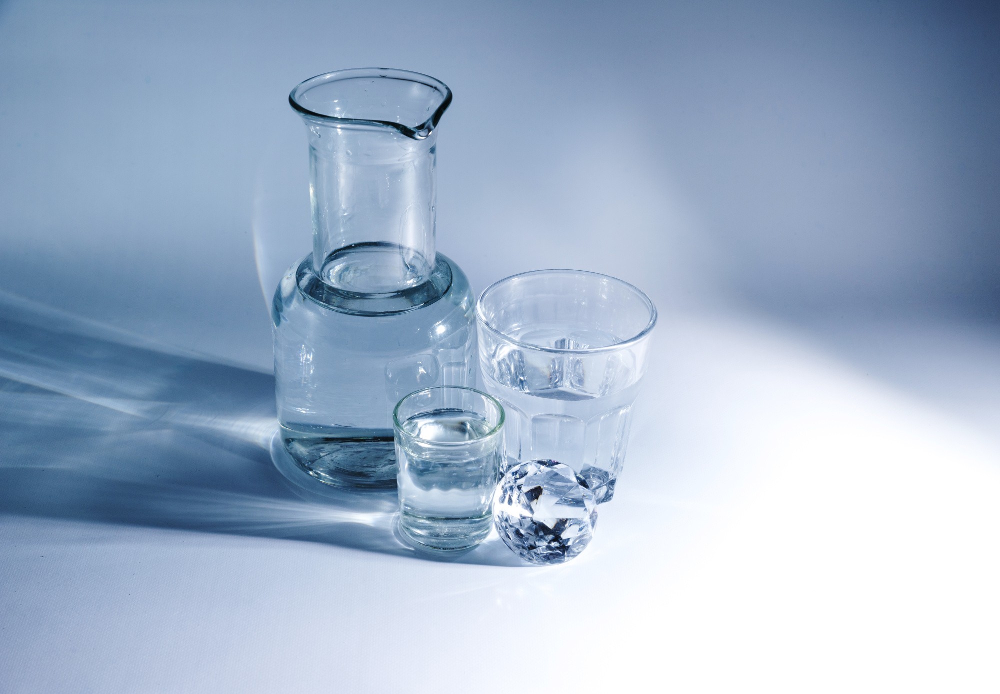 various-glass-material-containers-with-shiny-diamond-blue-background.jpg various-glass-material-containers-with-shiny-diamond-blue-background.jpg