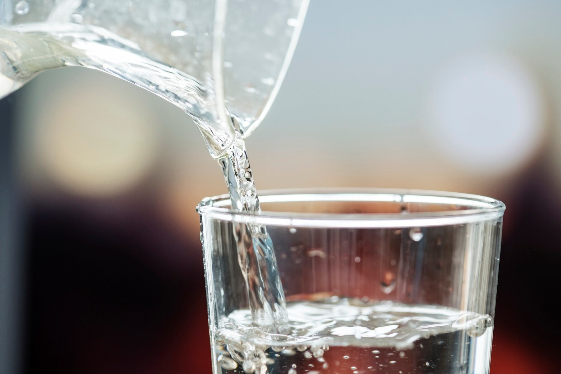 macro-shot-of-pouring-water-into-a-glass_53876-33665.jpg