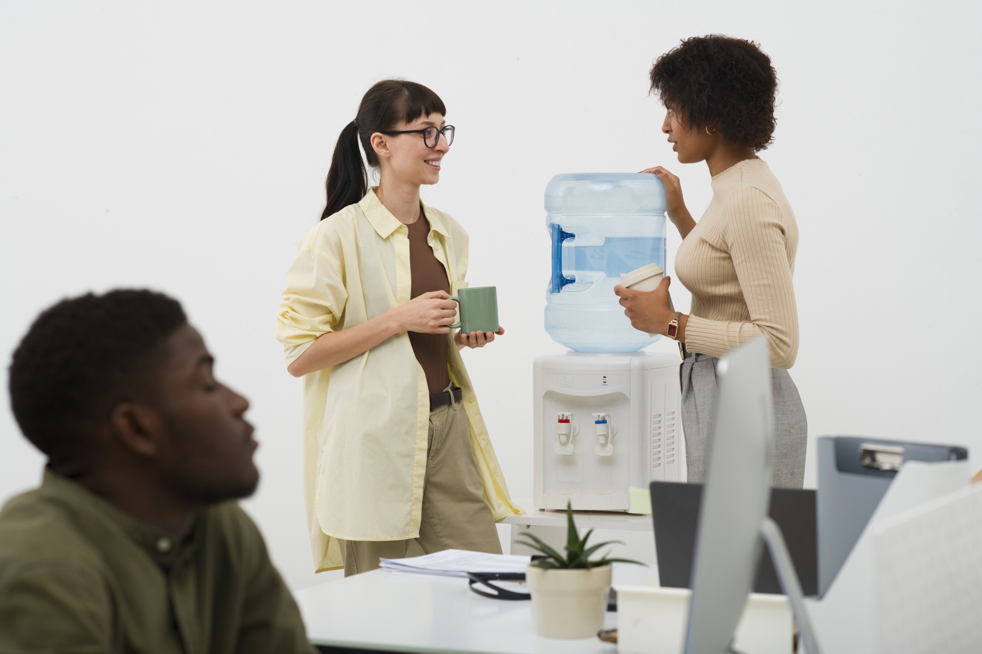 medium-shot-people-chatting-work (1).jpg medium-shot-people-chatting-work (1).jpg