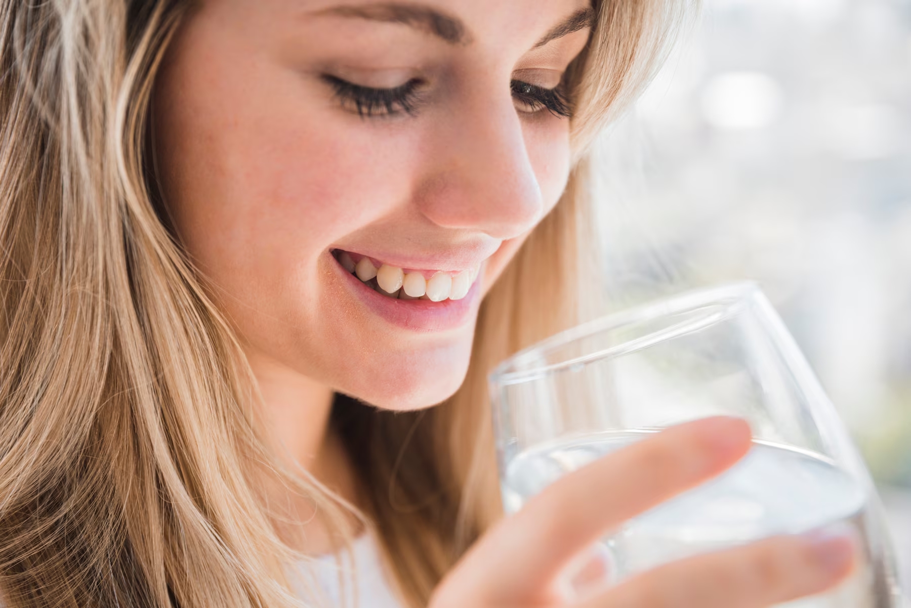 healthy-girl-holding-glass-of-water_23-2148113492.jpg.jpg