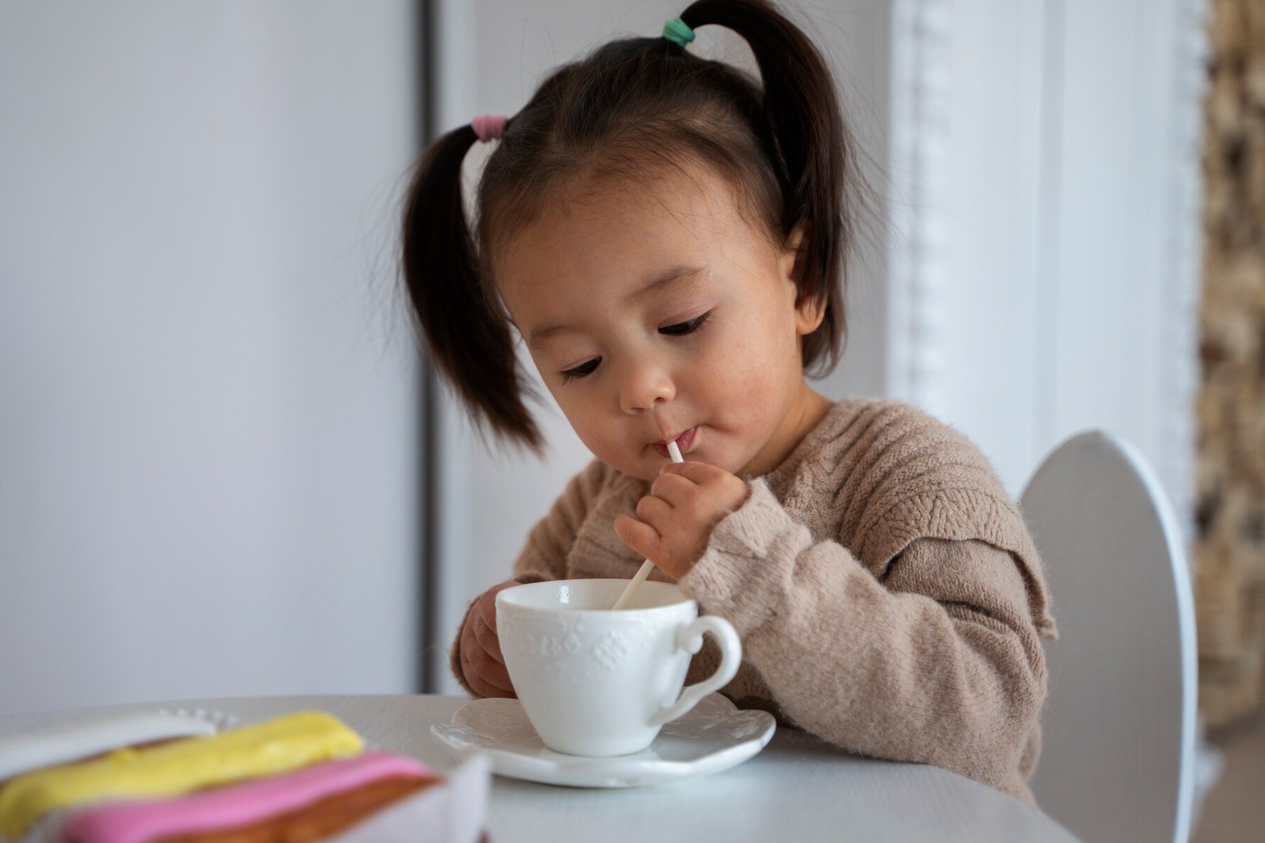 young-asian-girl-in-the-kitchen-at-home_23-2150259960.jpg