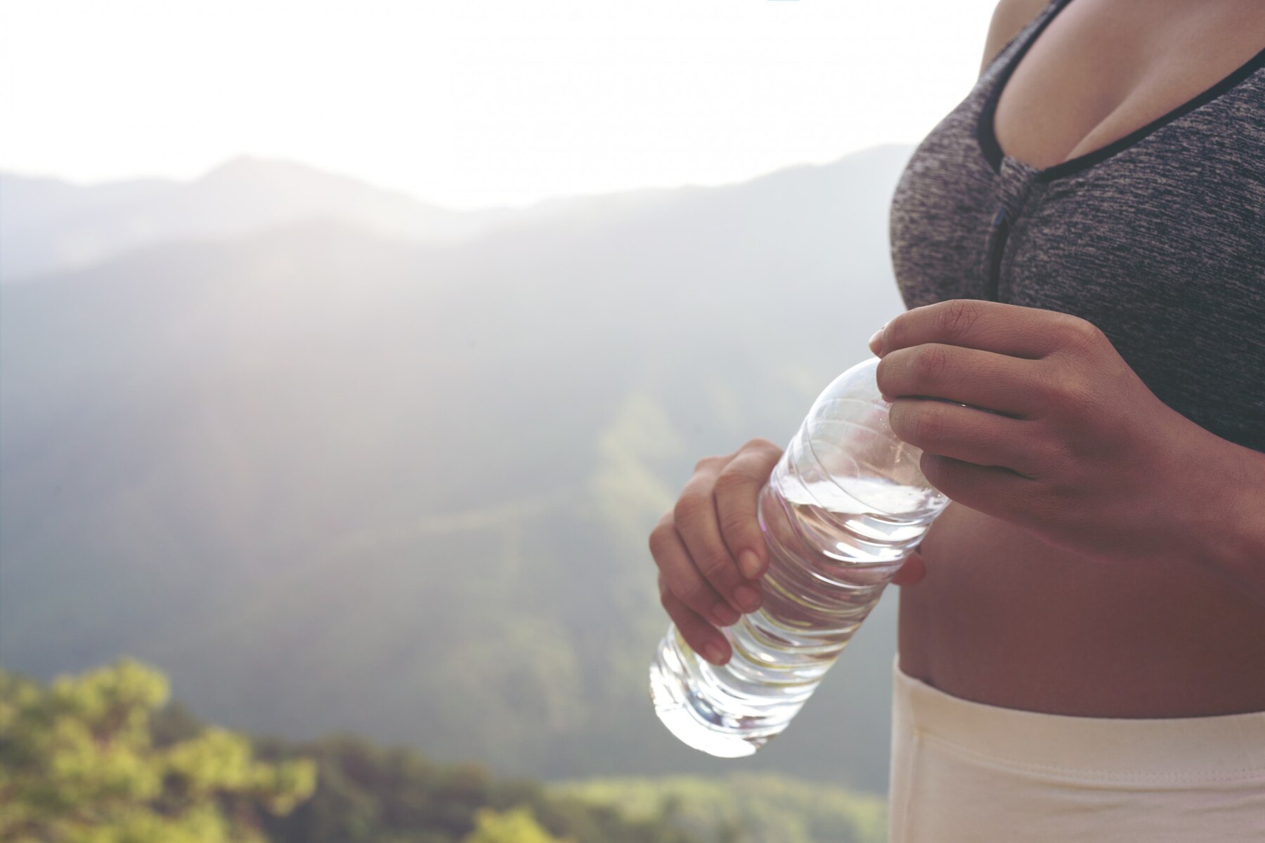 beautiful-asian-woman-meditating-exercising-top-mountain_1150-15303.jpg