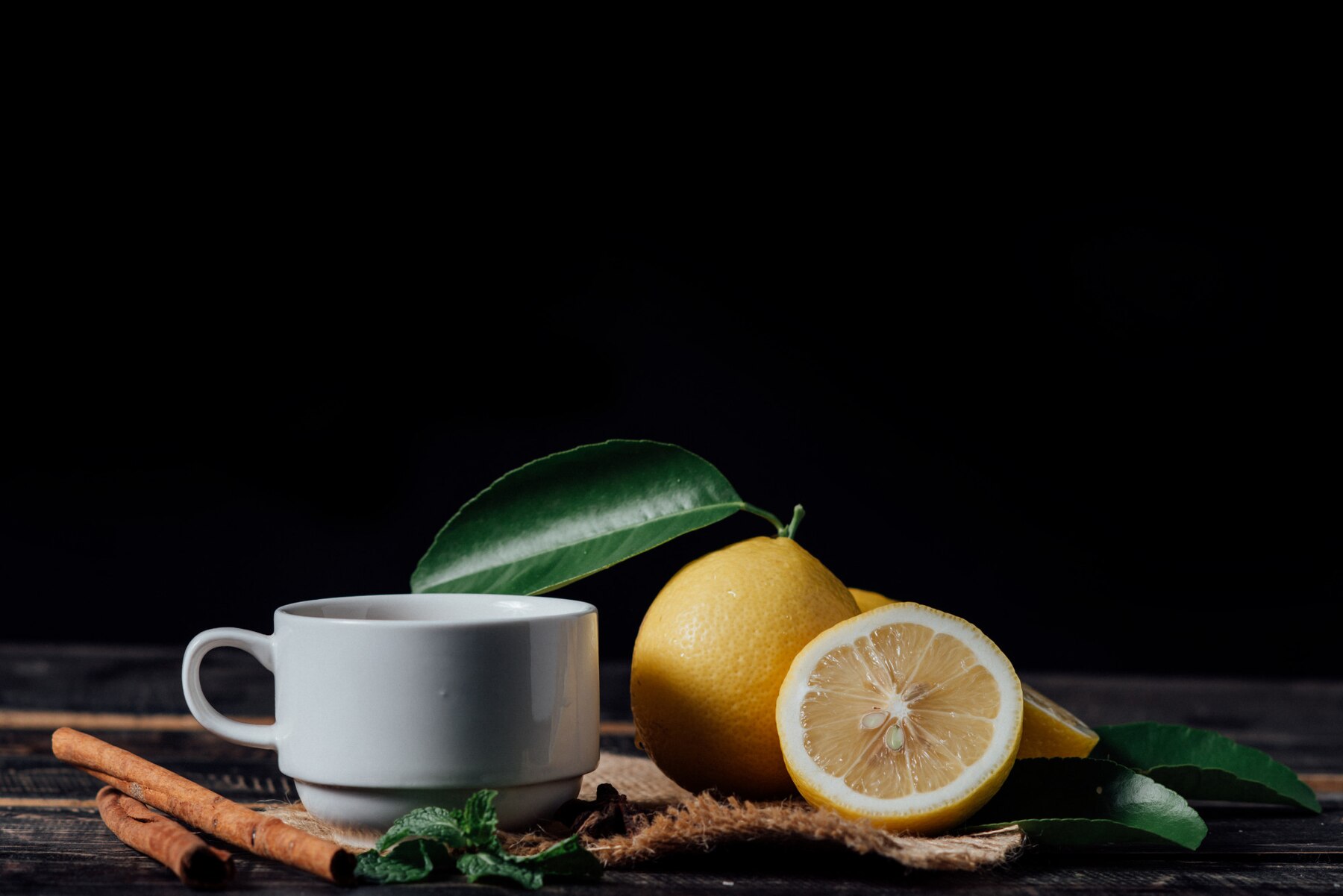 glasses-of-tea-with-lemon-sliced-lemons-on-a-chopping-board_1150-8942.jpg