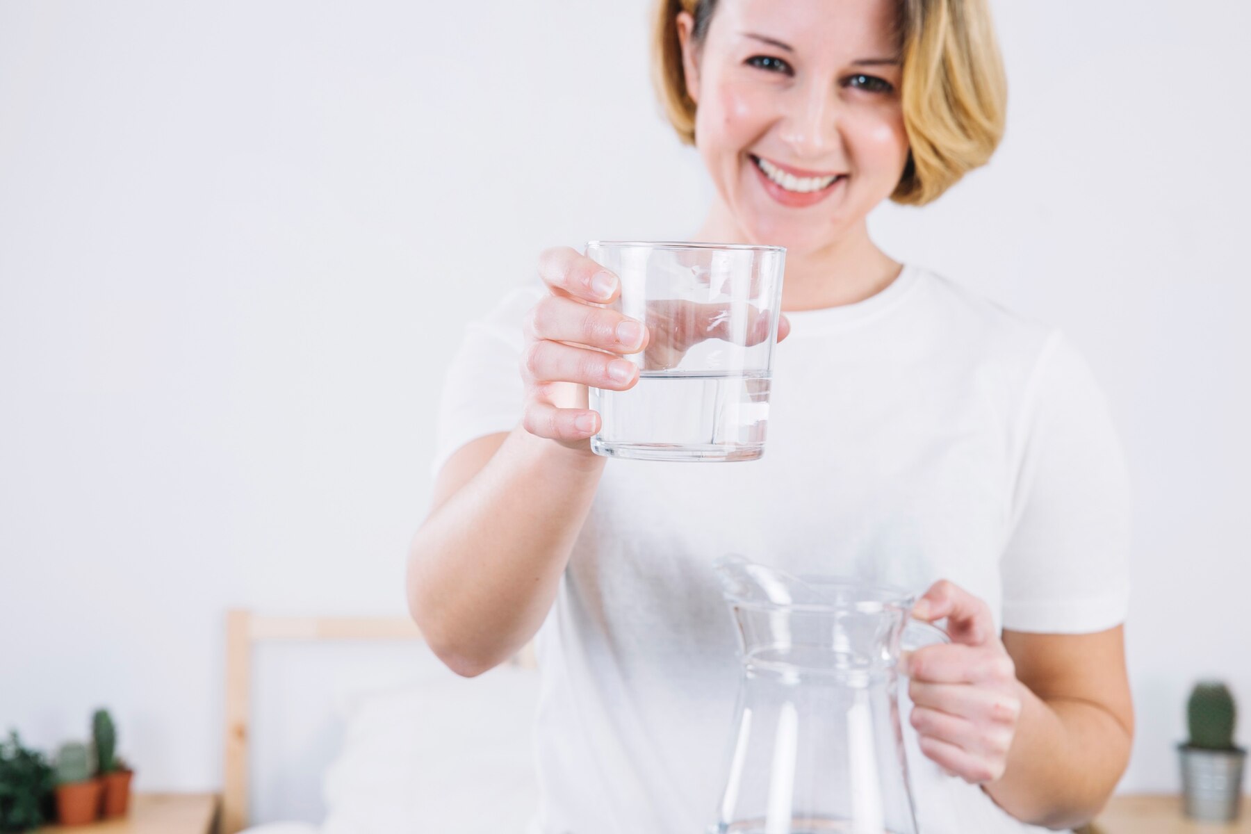 cheerful-woman-offering-water_23-2147765075.jpg