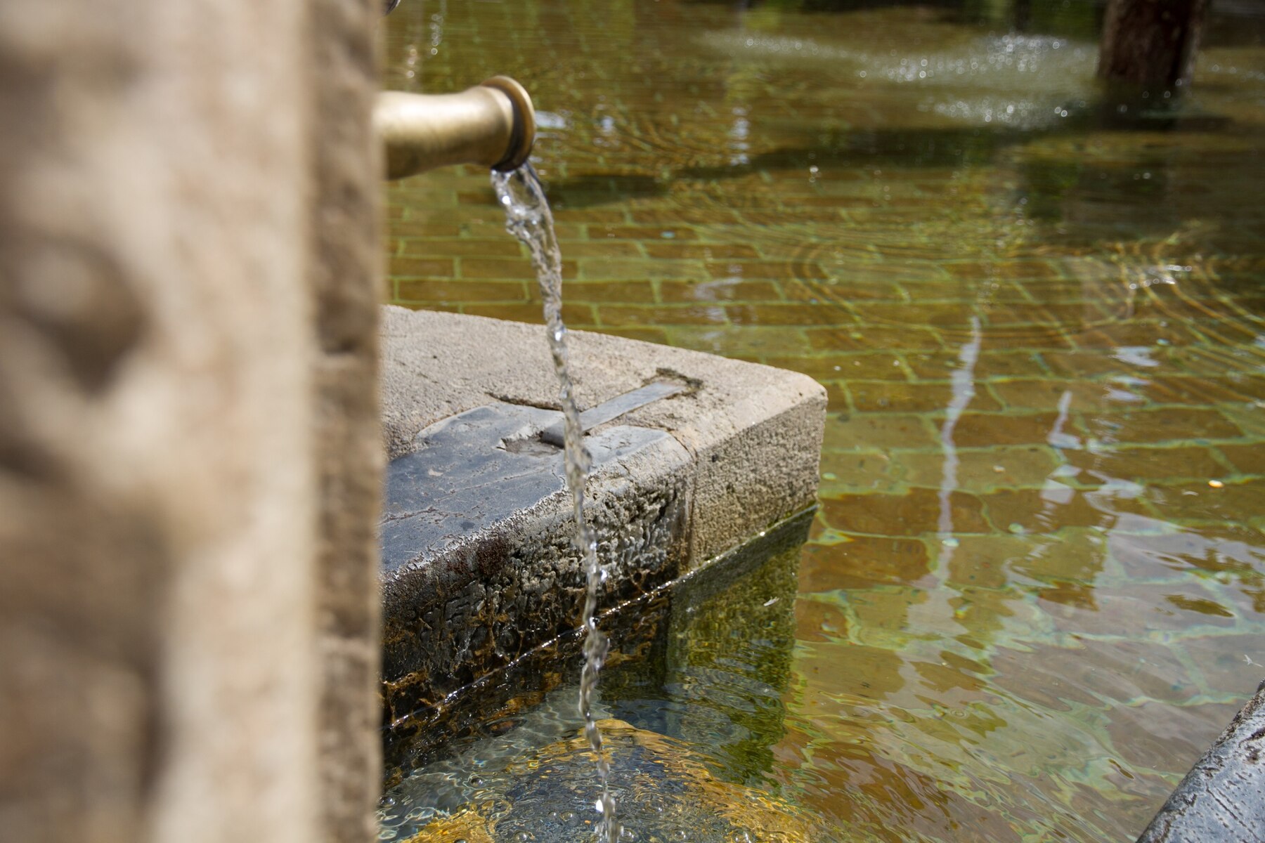 water-running-into-old-fountain-from_1194-7467.jpg